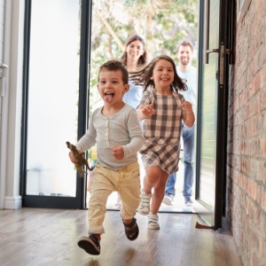 Children running through the front door.