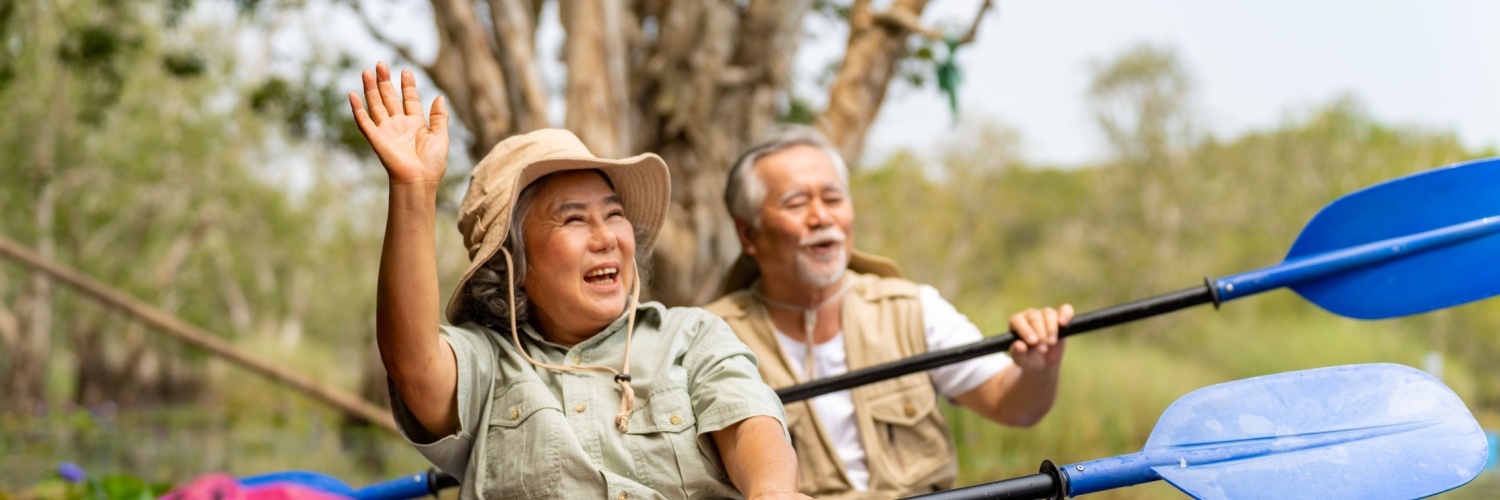An older couple kayaking.