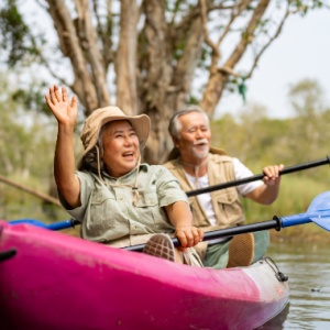 An older couple kayaking.
