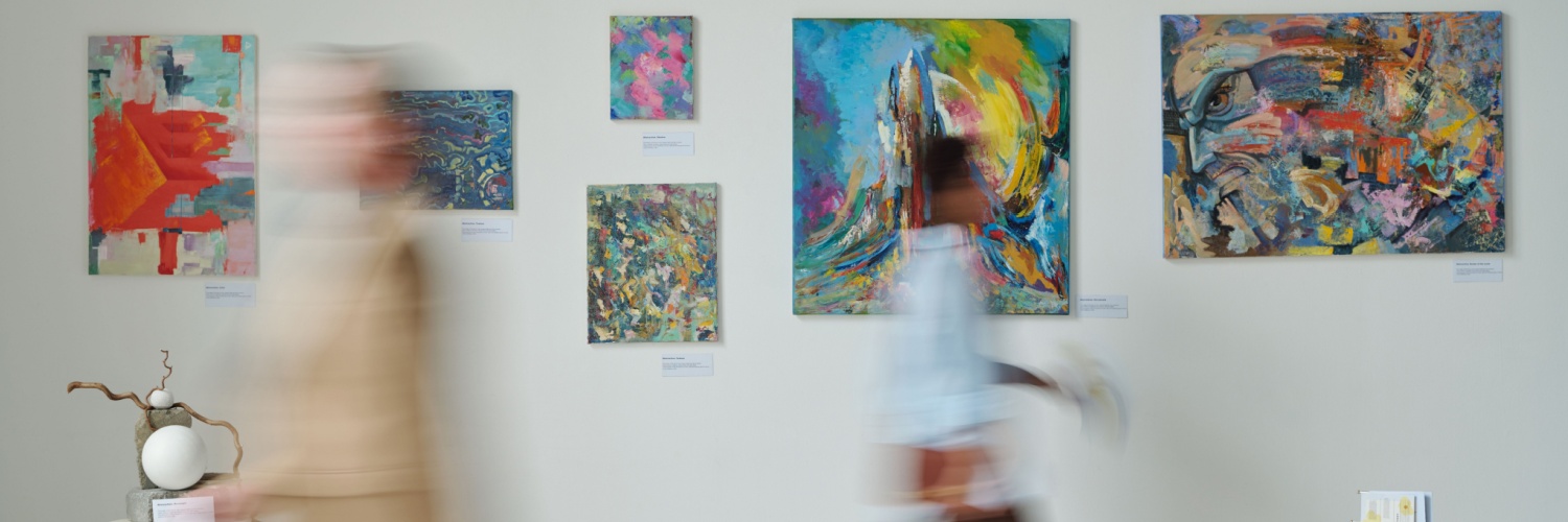 People walking through a museum.