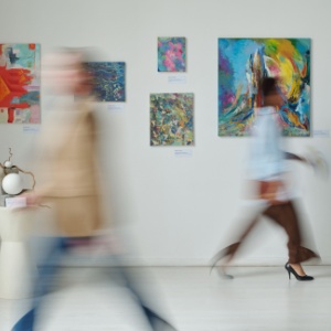 People walking through a museum.